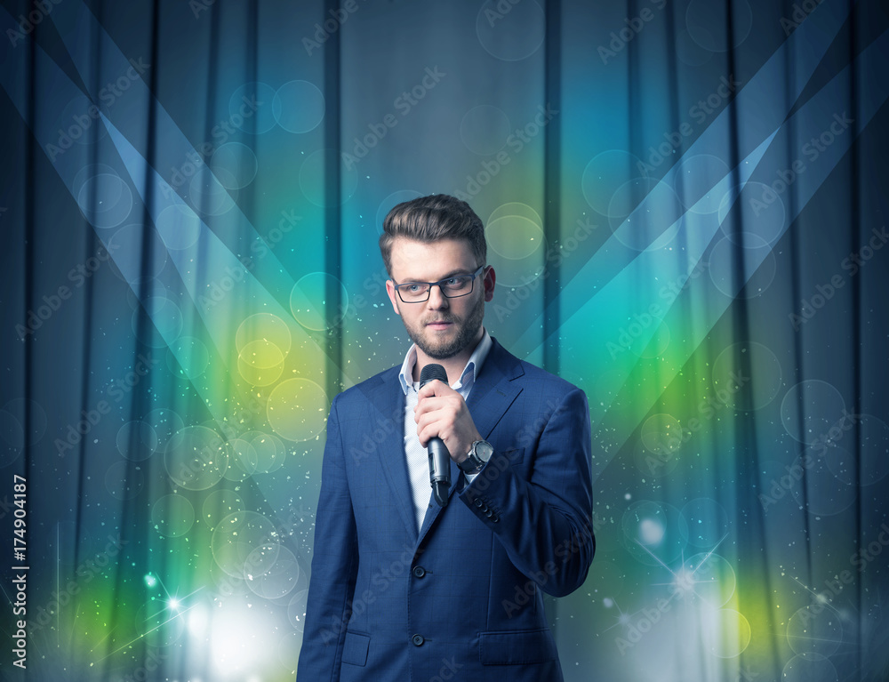 Businessman holding microphone