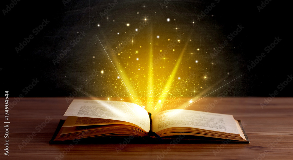 Fototapeta premium Yellow lights over book