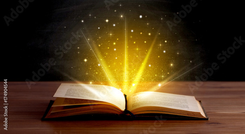 Yellow lights over book © ra2 studio