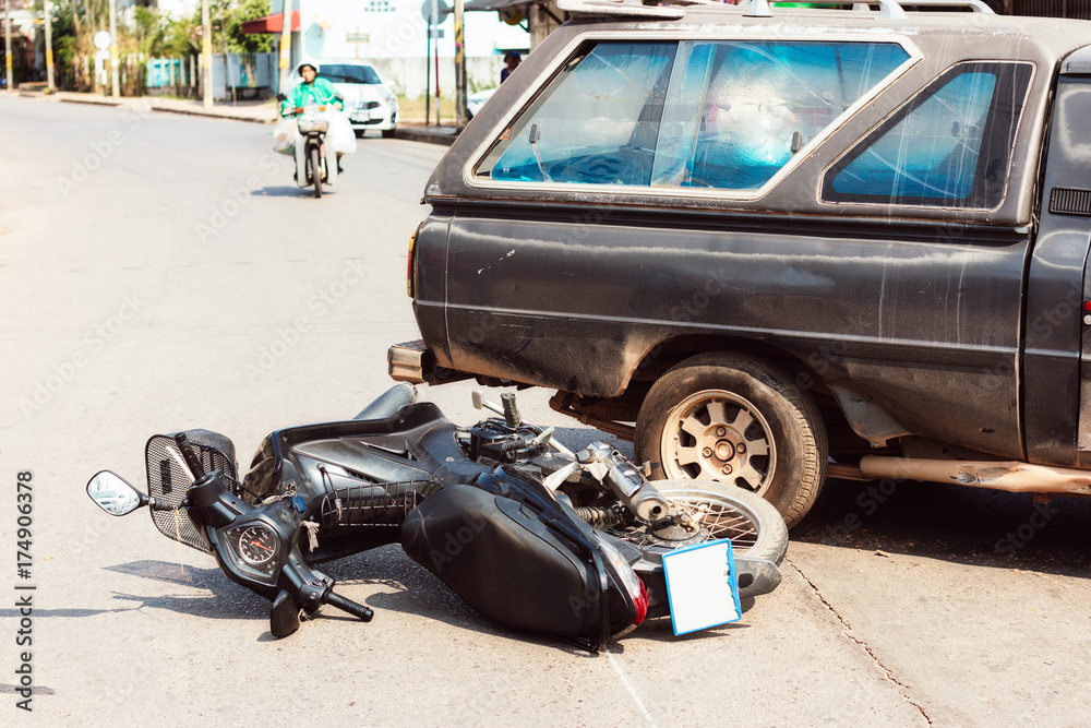 Fototapeta premium Motorcycle accident collides with car