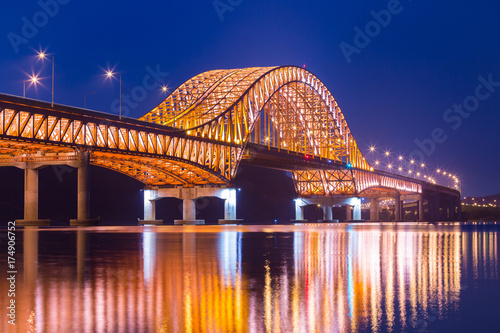 Bridge of Seoul Banghwa bridge beautiful Han river at night, Seoul, South Korea.