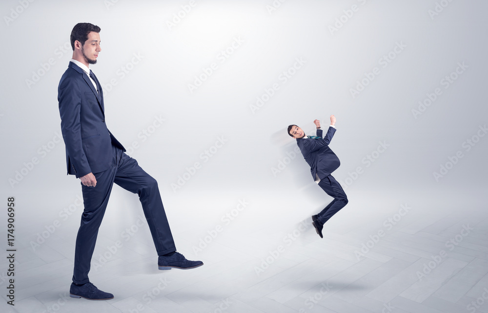 Small man fired by boss with white wallpaper Small man fired by boss with white wallpaper