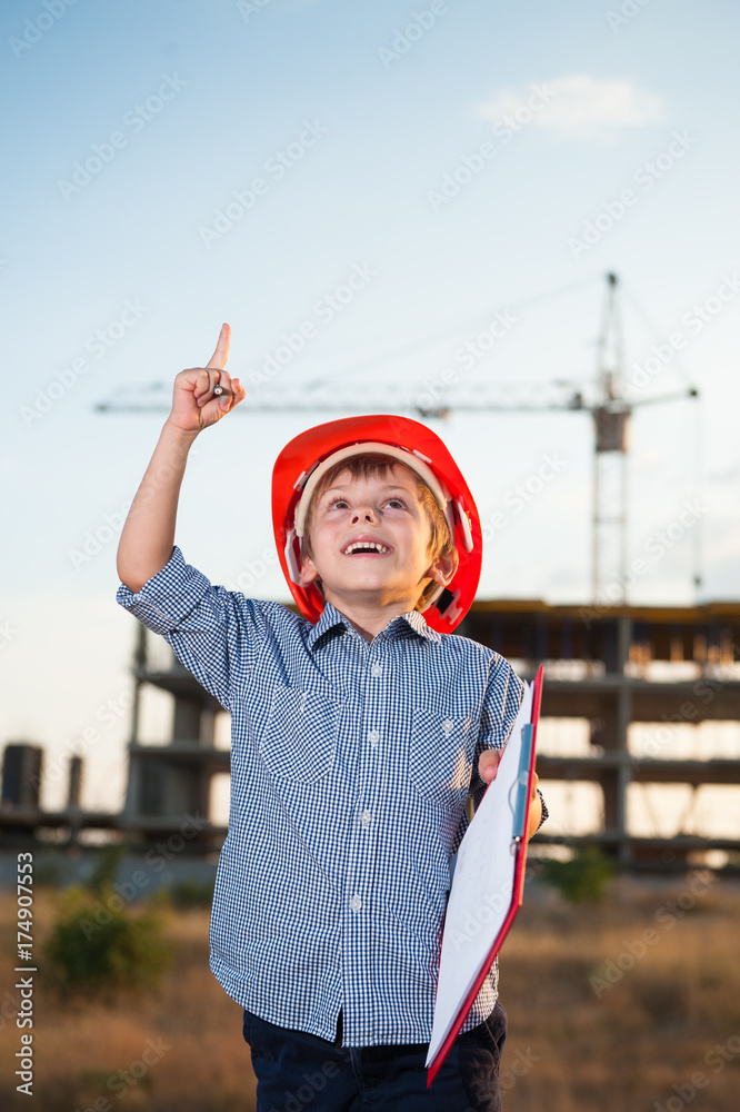 cute kid builder in a helmet found a solution cute kid builder in a helmet found a solution