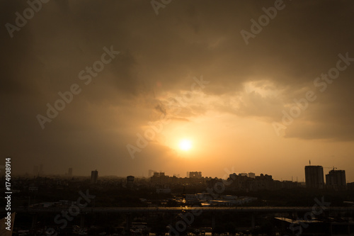 Yellow sun set in city