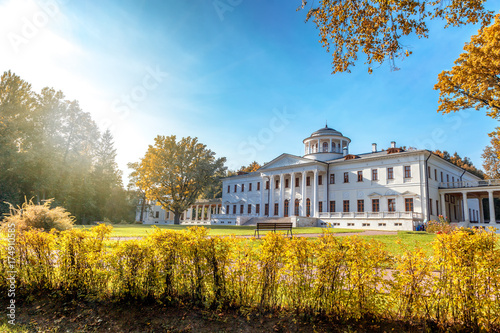 Traditional Russian farmstead, beautiful autumn landscape, Ostafyevo, Moscow, Russia. Historical architecture and cultural tourism photo