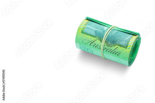 Rolled Australian banknotes isolated on white background with Textfree and clipping path. photo