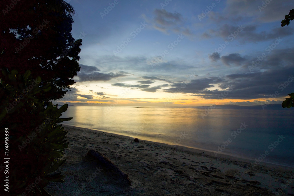 Fototapeta premium beautiful sunset in batanta island, raja ampat west papua