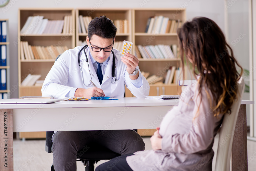 Pregnant woman visiting doctor for consultation Pregnant woman visiting doctor for consultation