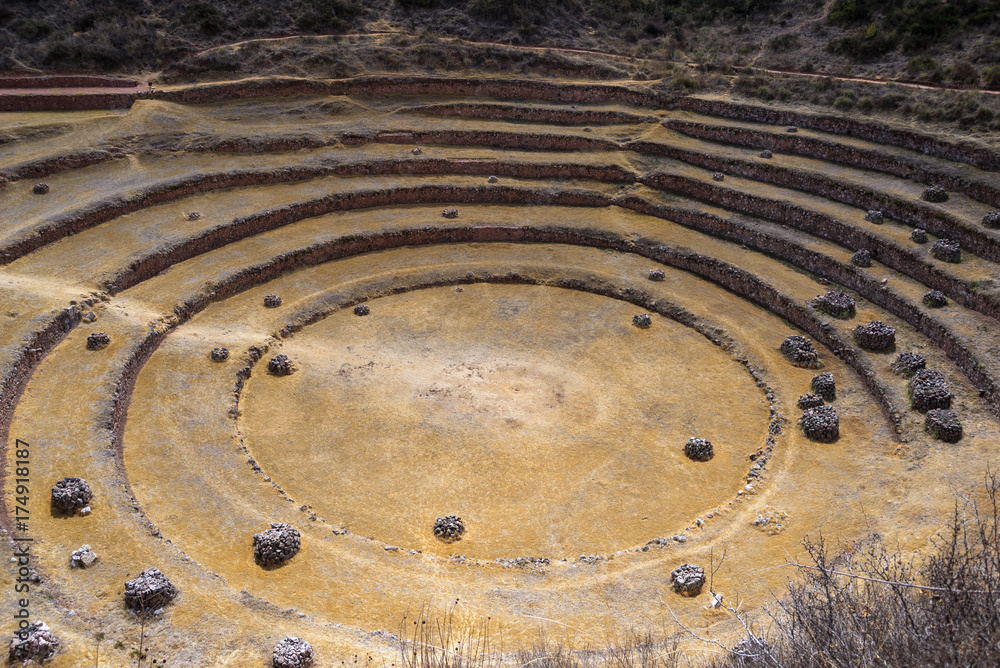 The archaeological site at Moray, travel destination in Cusco region and the Sacred Valley, Peru. Majestic concentric terraces, supposed Inca's food farming laboratory. The archaeological site at Moray, travel destination in Cusco region and the Sacred Valley, Peru. Majestic concentric terraces, supposed Inca's food farming laboratory.