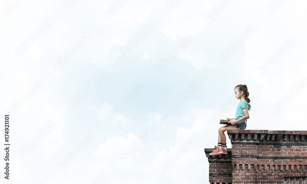 Concept of careless happy childhood with girl exploring this wor Concept of careless happy childhood with girl exploring this wor