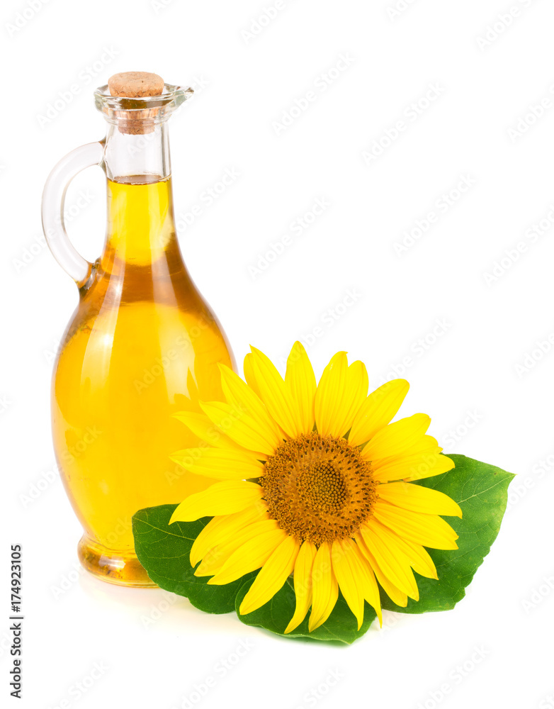 Sunflower oil and flower isolated on white background Sunflower oil and flower isolated on white background