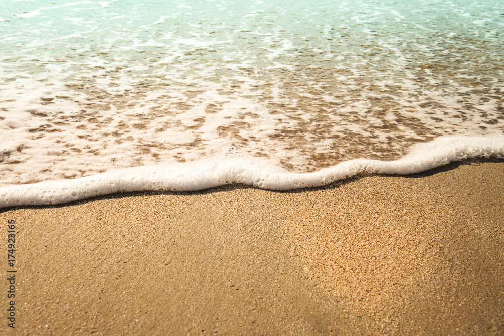 Background soft wave of Sea with foam on sandy beach. Background soft wave of Sea with foam on sandy beach.