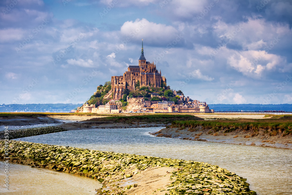Saint Michael's Mount is an island commune in Normandy. The island has held strategic fortifications since ancient times and has been the seat of a monastery.