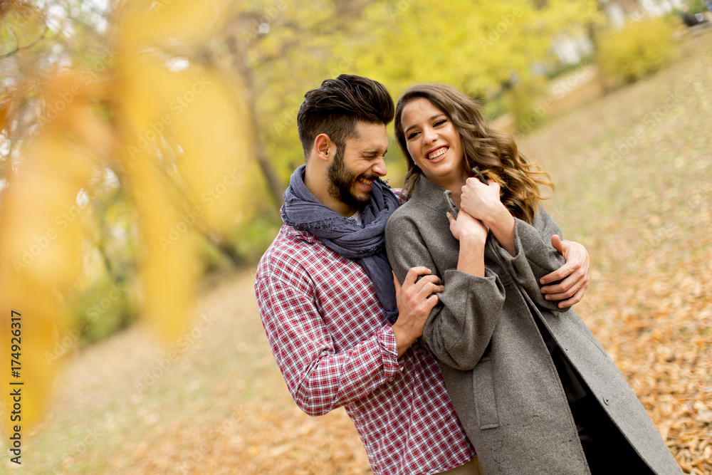 Lovely young couple in the autumn forest Lovely young couple in the autumn forest