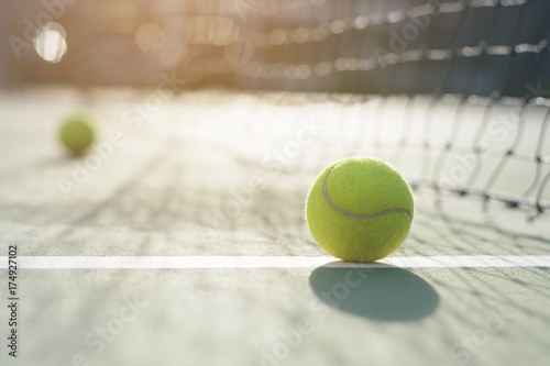 Tennis ball on blur net background © WK Stock Photo 