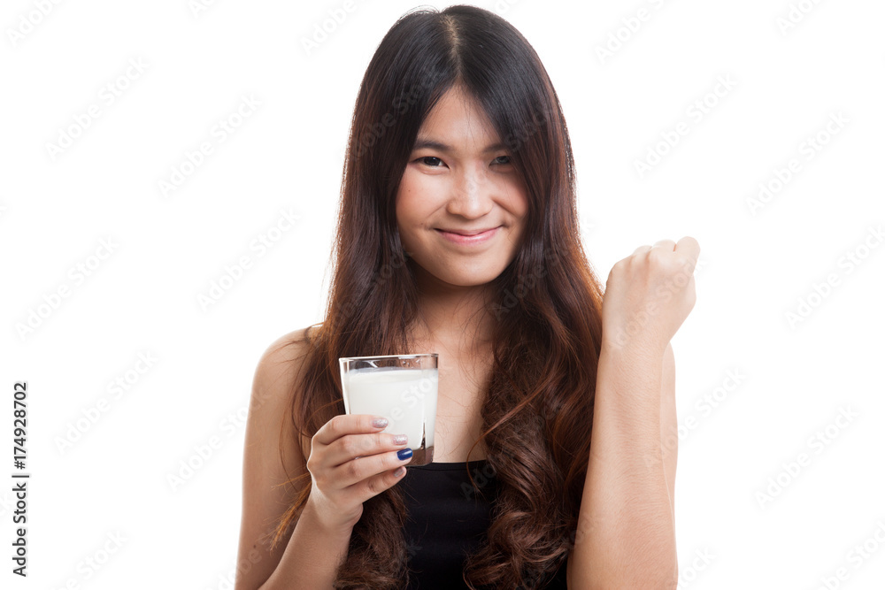 Healthy Asian woman drinking a glass of milk. Healthy Asian woman drinking a glass of milk.