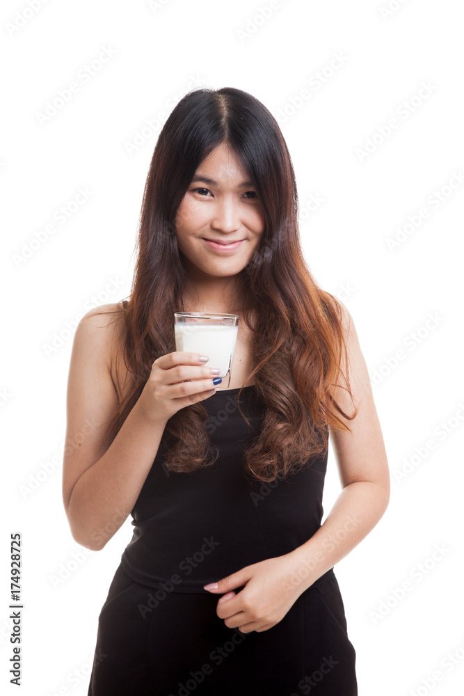 Healthy Asian woman drinking a glass of milk. Healthy Asian woman drinking a glass of milk.