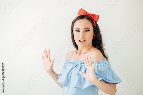 A woman making stop gesture with her hand photo