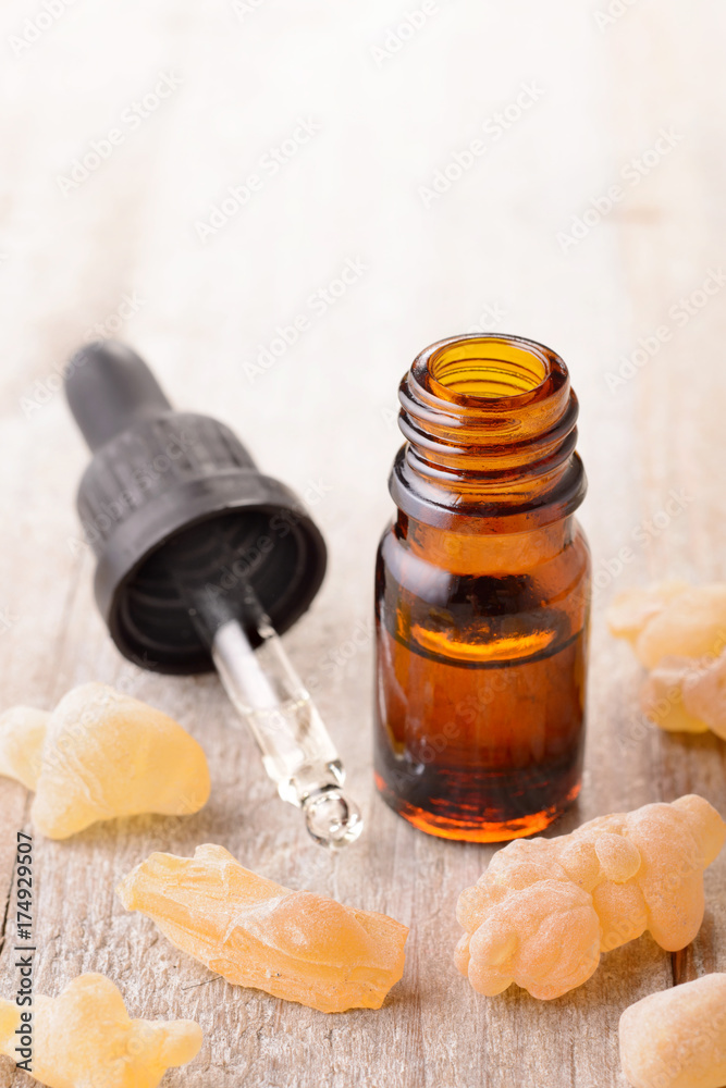 Frankincense essential oil on the table