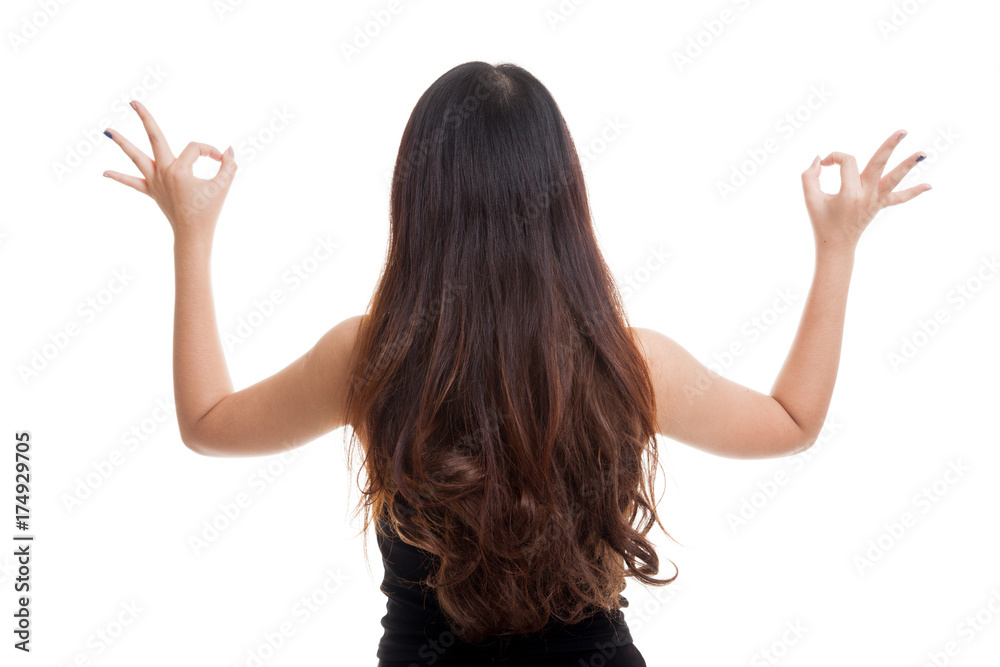 Back view of Asian woman show double OK hand sign. Back view of Asian woman show double OK hand sign.