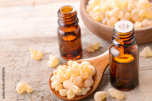 Frankincense essential oil on the table