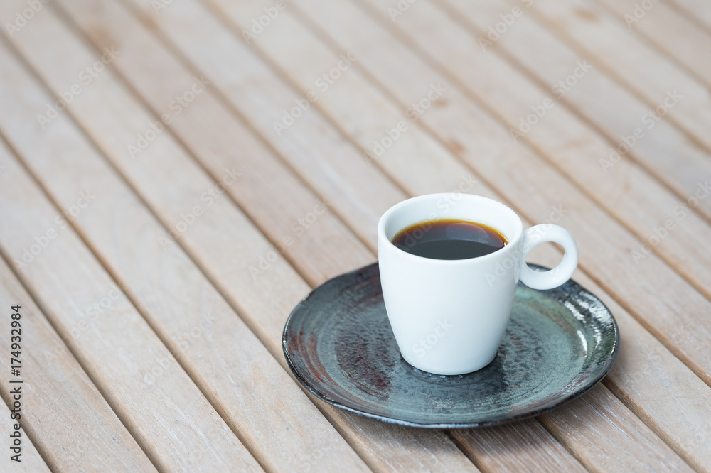 Coffee cup on wooden tables 