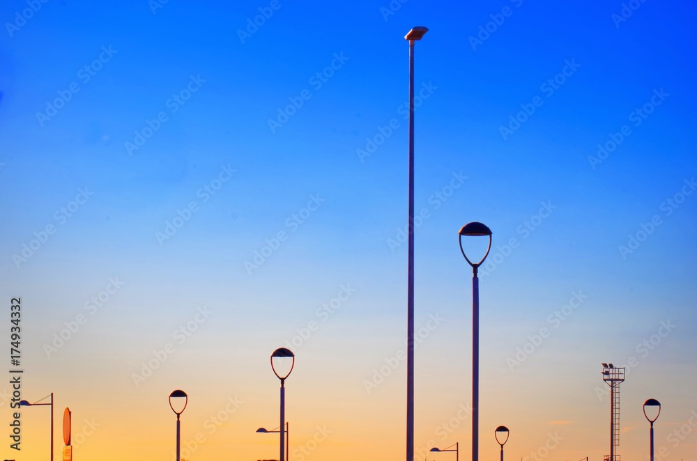Colorful minimal Composition with various Street Lamps at Sunset Colorful minimal Composition with various Street Lamps at Sunset