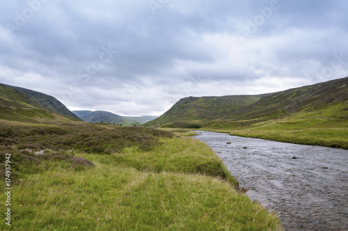 View of a river in the Highlands of Scotland in United Kingdom in an overcast day; Concept for travel in Scotland