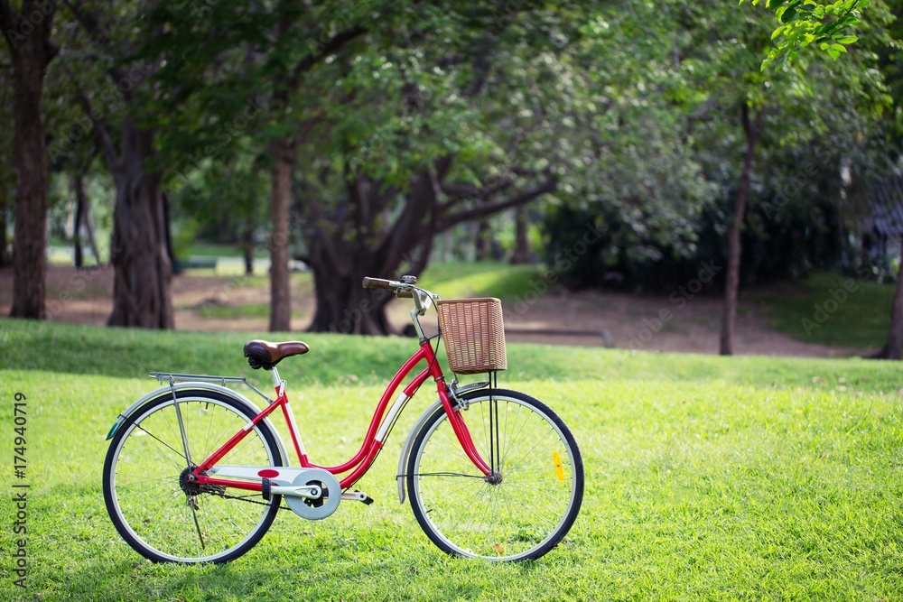 Red bike in the park.