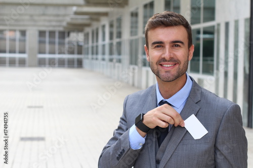 Businessman about to give you his business card 