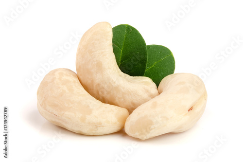 cashew nuts with leaf isolated on white background. macro