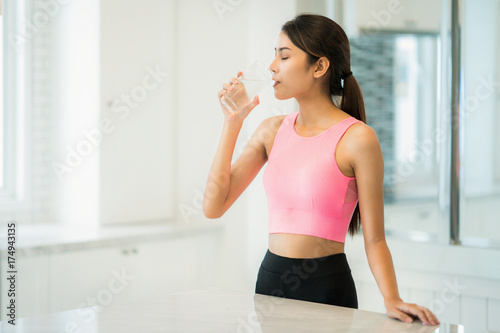 Asian lady drinking water