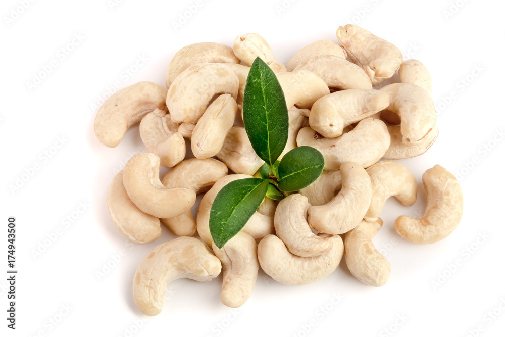 cashew nuts with leaf isolated on white background. macro cashew nuts with leaf isolated on white background. macro