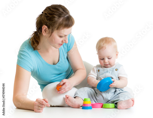 mother and baby playing wit...