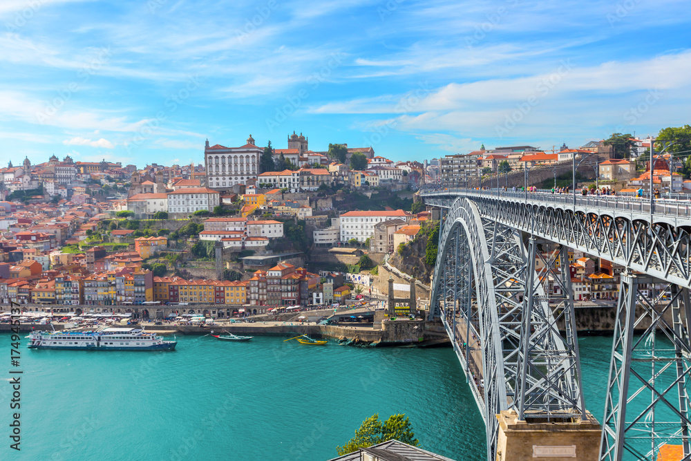 view of panoramic porto old town and dom luis bridge with duoro river ,portugal - obrazy, fototapety, plakaty 