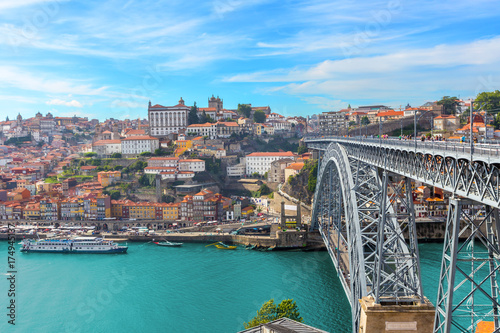 view of panoramic porto old town and dom luis bridge with duoro river ,portugal photo