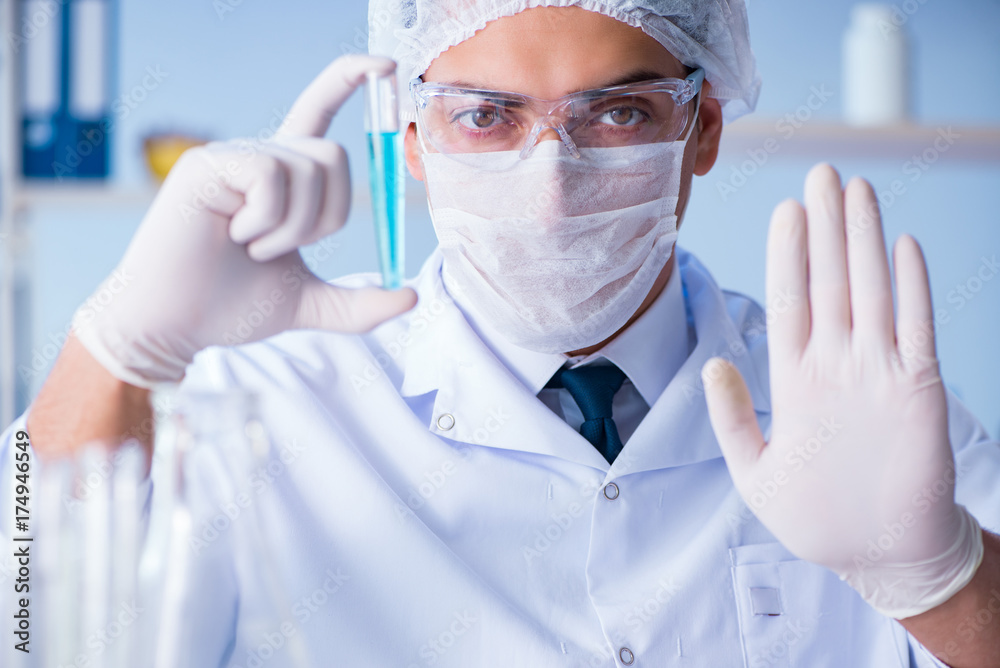 Female scientist researcher conducting an experiment in a labora Female scientist researcher conducting an experiment in a labora