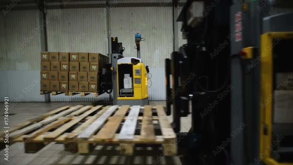 Camera cranes up on shelves of cardboard boxes inside a storage warehouse. Camera cranes up on shelves of cardboard boxes inside a storage warehouse.