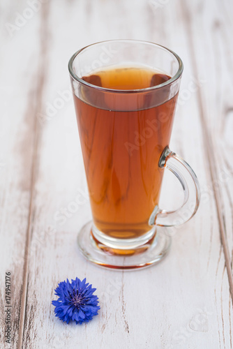 A cup of tea and flowers