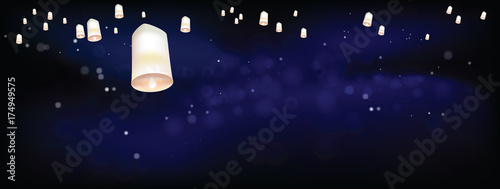 White Floating lanterns in dark night ceremony Thailand
