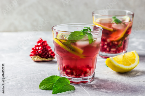 Refreshing cold pomegranate cocktail. Selective focus, space for text. 