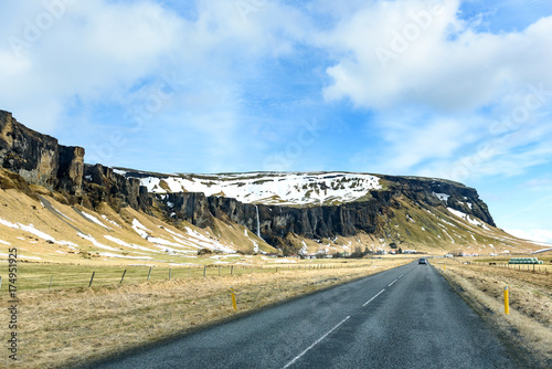 Rent a car and drive on the road along beautiful landscape of Iceland, the dream desination for traveller photo