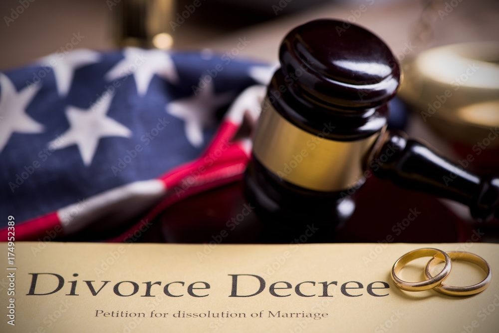 Divorce decree and gavel on a table..