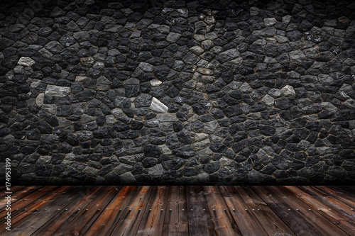 Granite stone wall with wood floor texture.