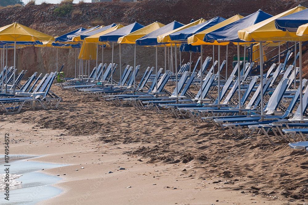 Beach, plenty of sunbeds and umbrellas. Desert. Beach, plenty of sunbeds and umbrellas. Desert.