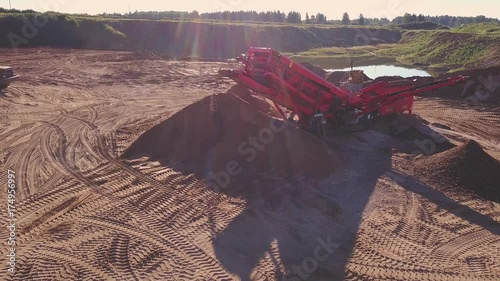 Aerial view of loading sand into trucks