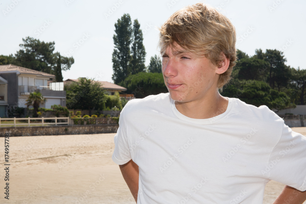 Handsome young boy posing during summer holidays Handsome young boy posing during summer holidays