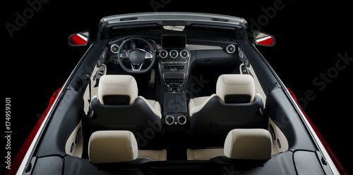 Modern cabriolet car interior, aerial view, isolated on black background, clipping path included photo