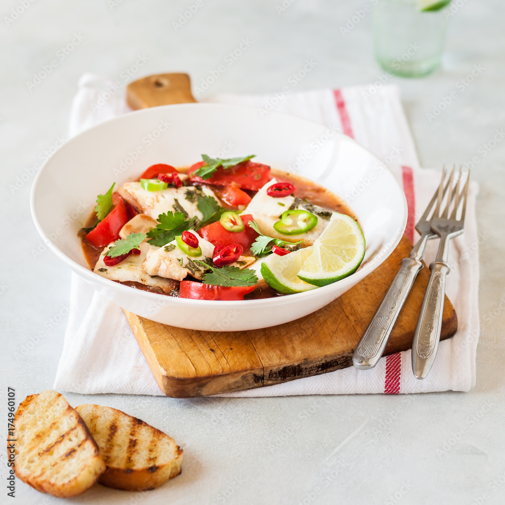 Fotografie Tomato and Coconut Milk Fish Stew