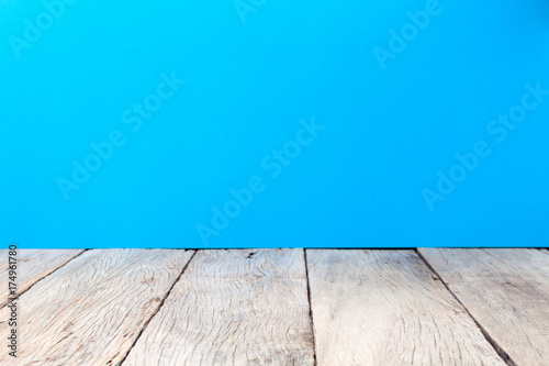 wooden floor on blue background.